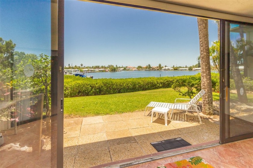 Paradise Remains! This lovely ground level, end unit in the - Beach Condo for sale in Holmes Beach, Florida on Beachhouse.com
