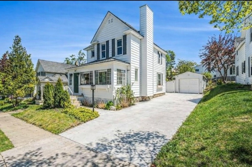 Just blocks from Petoskey's coveted Gaslight District and the - Beach Home for sale in Petoskey, Michigan on Beachhouse.com