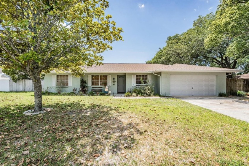 Charming 3-Bedroom Home with Modern Upgrades and Scenic Views in - Beach Home for sale in Spring Hill, Florida on Beachhouse.com