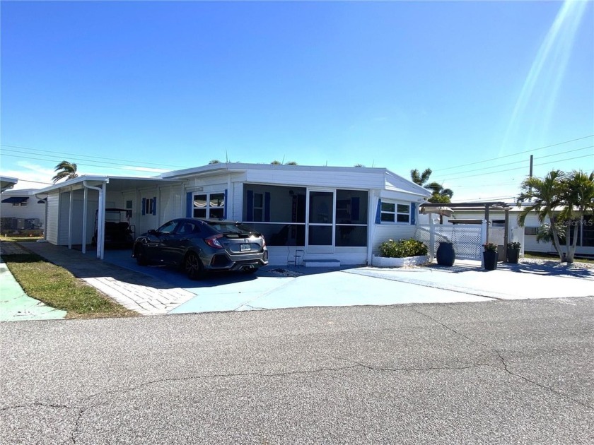 Spacious and updated, this 3-bedroom, 2-bath home sits on an - Beach Home for sale in Bradenton, Florida on Beachhouse.com