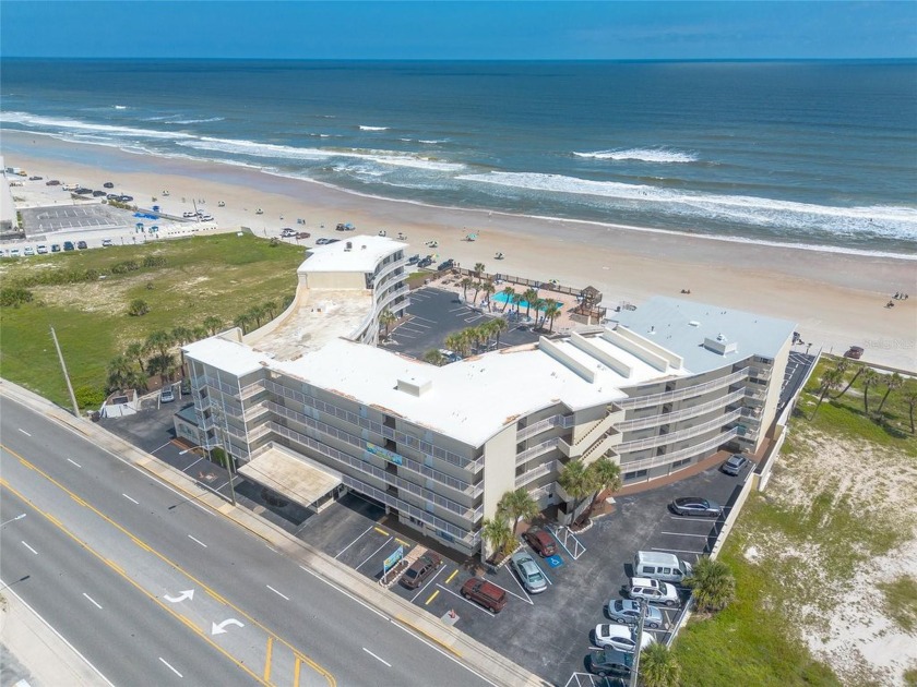 Step into beachfront living with this fully furnished oceanfront - Beach Home for sale in Daytona Beach, Florida on Beachhouse.com