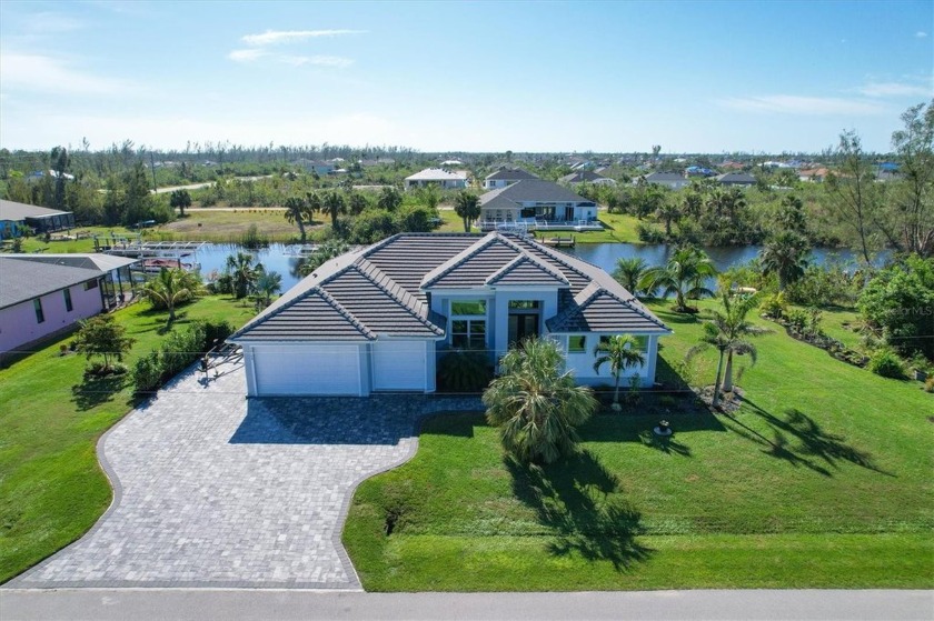 Must see this CONTEMPORARY WATERFRONT BEAUTY that exudes rest - Beach Home for sale in Port Charlotte, Florida on Beachhouse.com