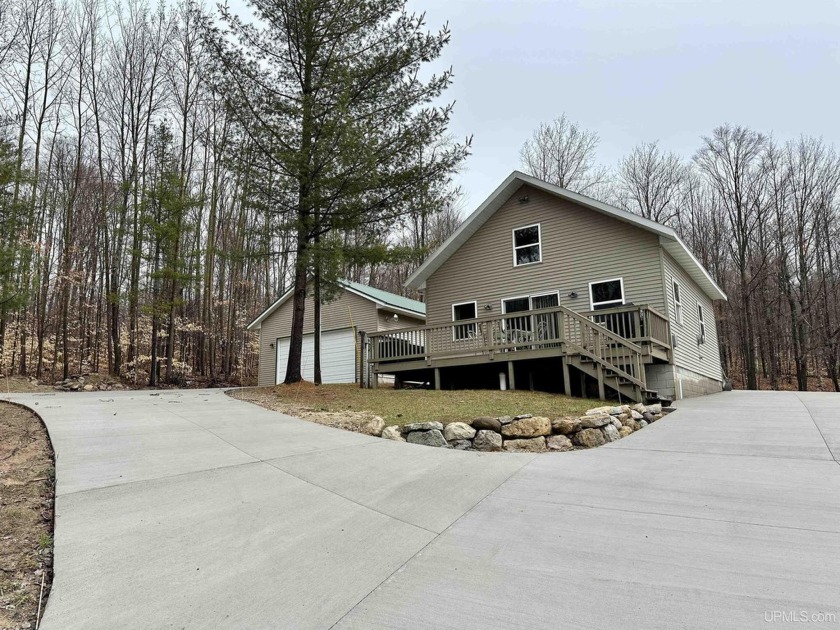 Located in the heart of the Hiawatha National Forest on a county - Beach Home for sale in Manistique, Michigan on Beachhouse.com
