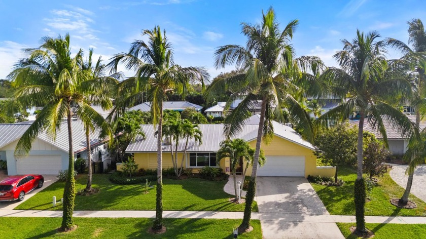 Welcome to this canal front tropical oasis, located in the heart - Beach Home for sale in Jupiter, Florida on Beachhouse.com