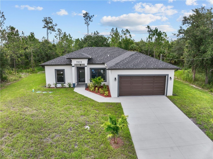 Welcome to this stunning and beautiful new 2024 home on a - Beach Home for sale in Lehigh Acres, Florida on Beachhouse.com