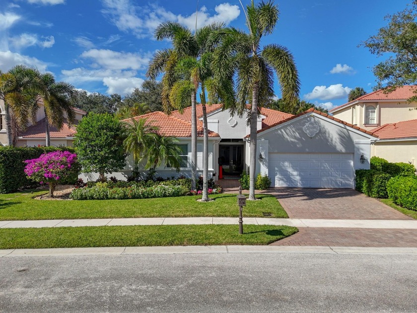 Must see this Beautifully remodeled one-level pool home in one - Beach Home for sale in Palm Beach Gardens, Florida on Beachhouse.com