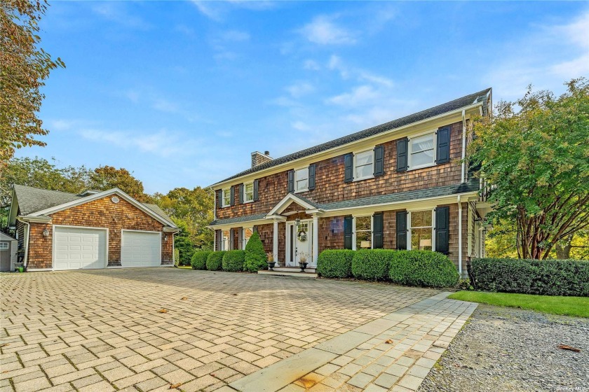 Enjoy the best of Hamptons waterfront living on this private 1.5 - Beach Home for sale in Eastport, New York on Beachhouse.com