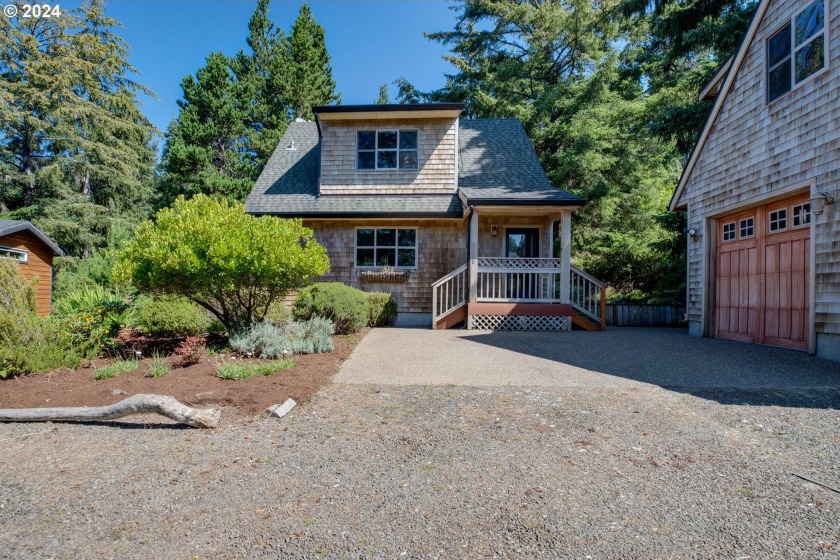 Step into this beautifully updated coastal cottage, where charm - Beach Home for sale in Tillamook, Oregon on Beachhouse.com