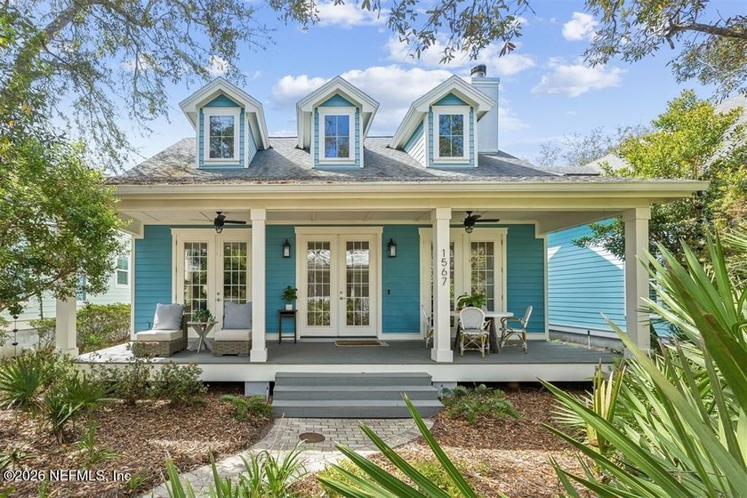 Tucked along one of Amelia Park's charming garden paths, this - Beach Home for sale in Fernandina Beach, Florida on Beachhouse.com