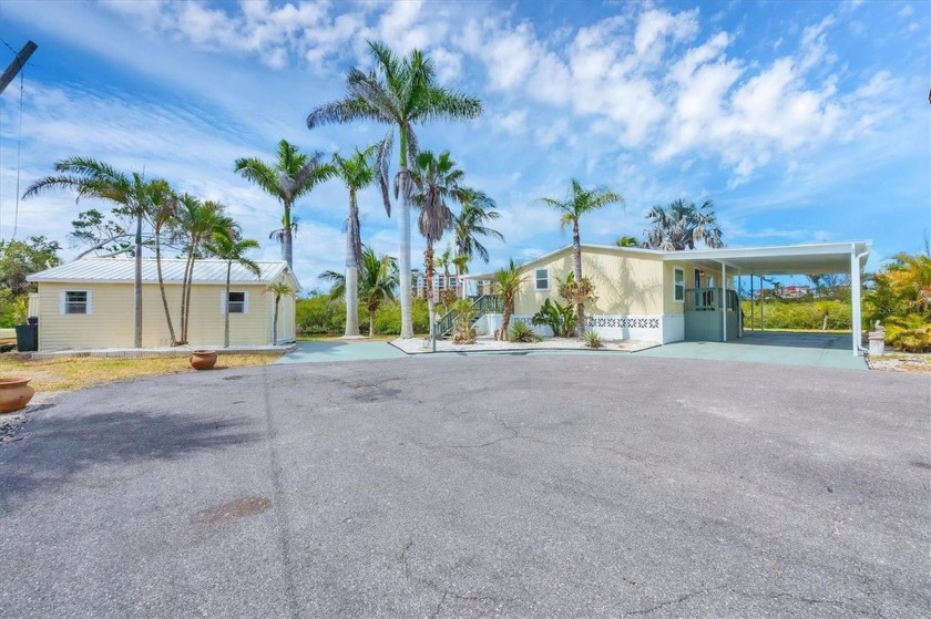 WATERFRONT, elevated home with oversized lot (.68 acres) - Beach Home for sale in Venice, Florida on Beachhouse.com
