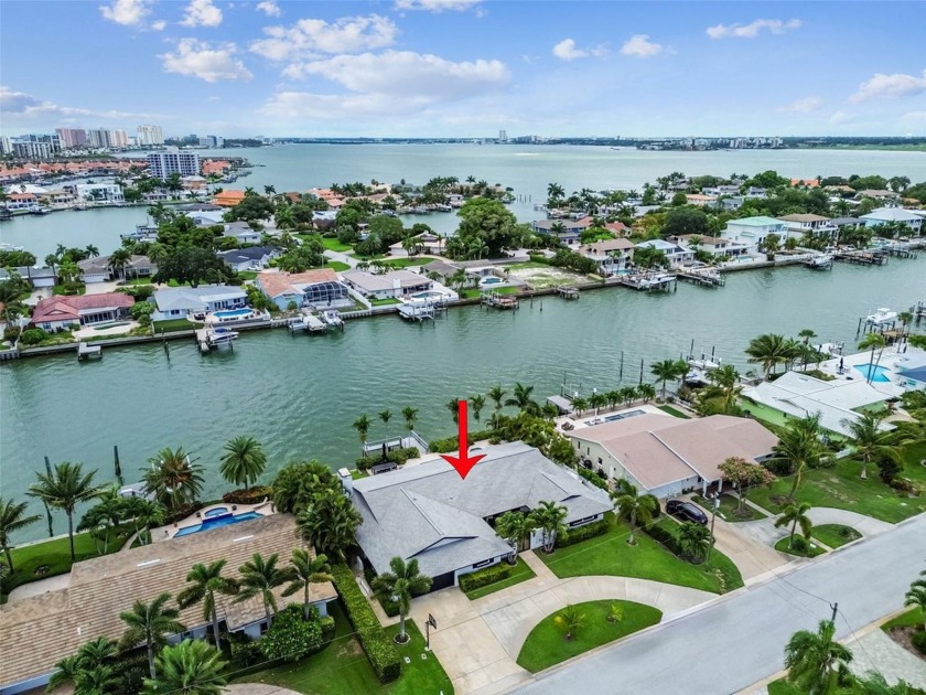 Welcome to this stunning 5-bedroom, 3-bathroom waterfront home - Beach Home for sale in Belleair Beach, Florida on Beachhouse.com