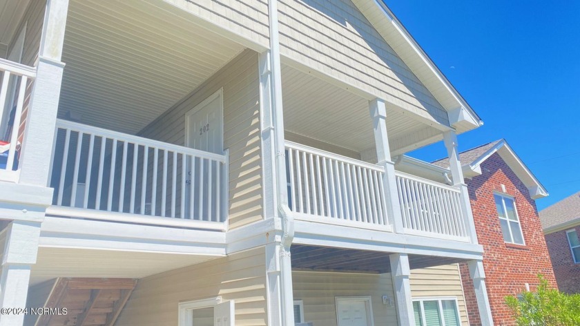 This move-in ready home awaits you. Revel in the seamless tile - Beach Condo for sale in Wilmington, North Carolina on Beachhouse.com
