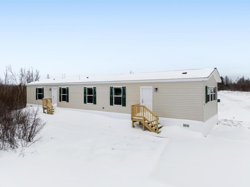 This new 2025 3-bedroom, 2-bathroom spacious mobile home is a - Beach Home for sale in Alanson, Michigan on Beachhouse.com