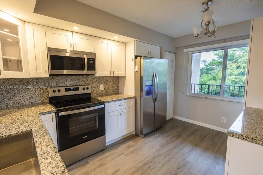 Spacious 2 bedroom 2 bath with large ENCLOSED BALCONY , storage - Beach Condo for sale in Pembroke Pines, Florida on Beachhouse.com