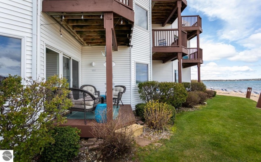 Nestled on the coveted *Miracle Mile* beach, this fully - Beach Condo for sale in Traverse City, Michigan on Beachhouse.com