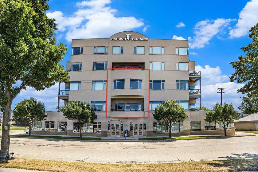 Harbor Terrace Condominium - Enjoy a WEST facing view that - Beach Condo for sale in Ludington, Michigan on Beachhouse.com