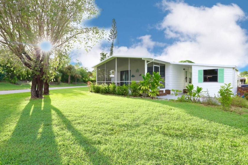 You will fall in love with the huge, screened porch on this home - Beach Home for sale in North Fort Myers, Florida on Beachhouse.com