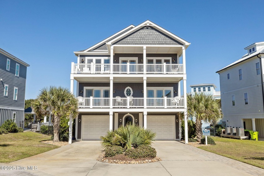 Experience coastal luxury and exceptional design in this - Beach Home for sale in Indian Beach, North Carolina on Beachhouse.com