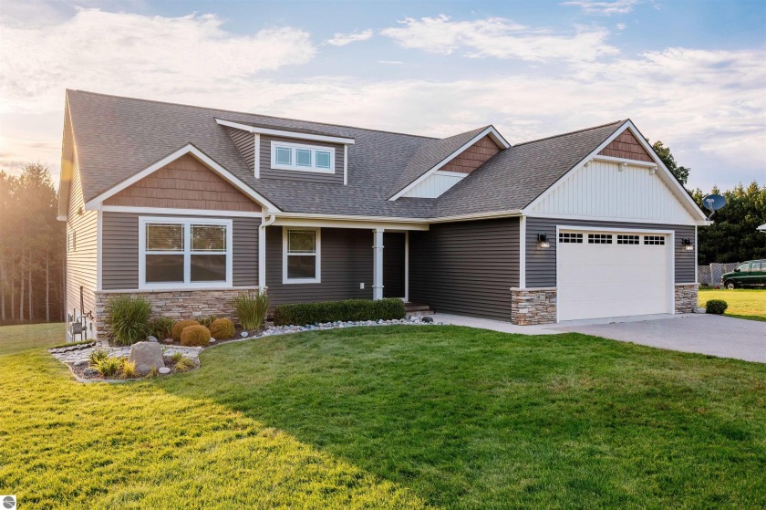 This 3-bedroom, 2-bath home sits on just over an acre, featuring - Beach Home for sale in Traverse City, Michigan on Beachhouse.com