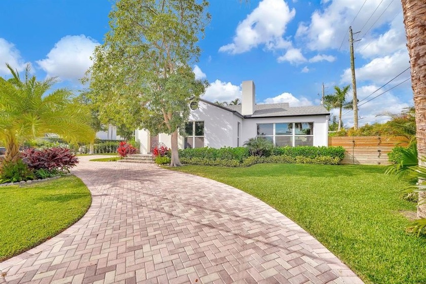 Beautifully renovated and impeccably designed, this - Beach Home for sale in West Palm Beach, Florida on Beachhouse.com