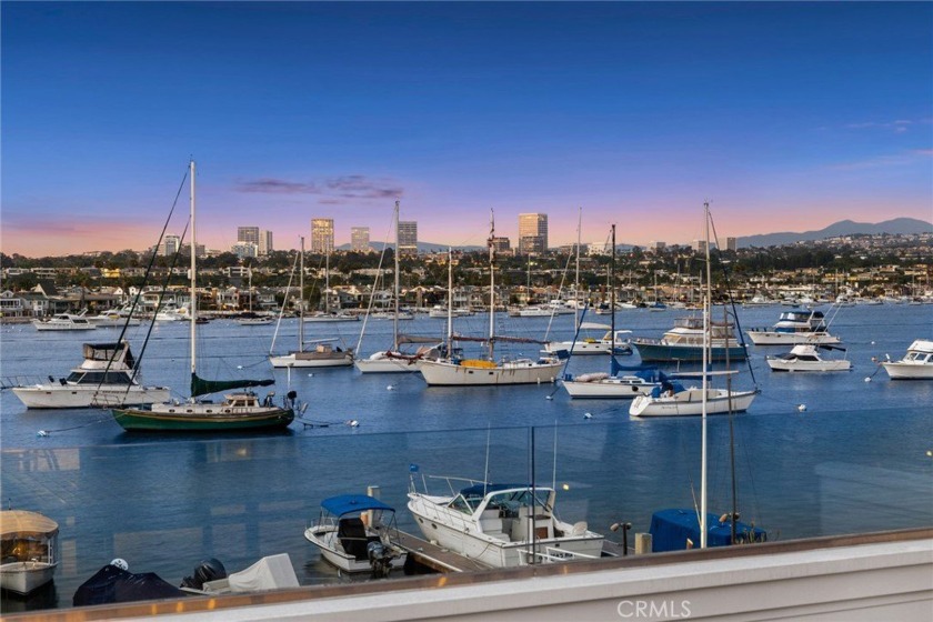 Occupying an enviable position on Newport Harbor, this recently - Beach Home for sale in Newport Beach, California on Beachhouse.com