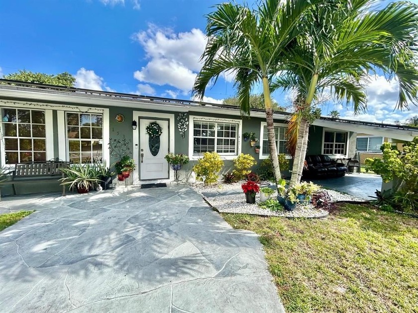 Discover this spacious, updated, and well-kept single-family - Beach Home for sale in North Lauderdale, Florida on Beachhouse.com