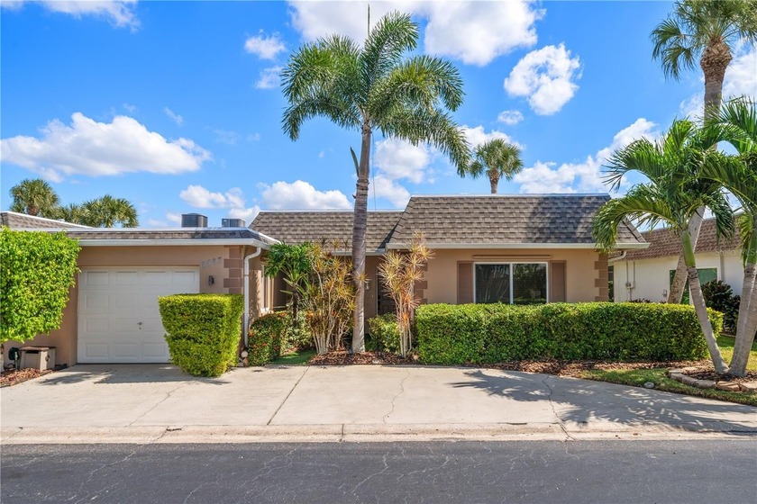 This home is located within the Seminole Lake Country Club - Beach Home for sale in Seminole, Florida on Beachhouse.com