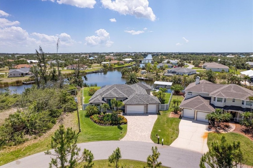 Nestled on a rare .37-acre tip lot in the sought-after SGC - Beach Home for sale in Port Charlotte, Florida on Beachhouse.com