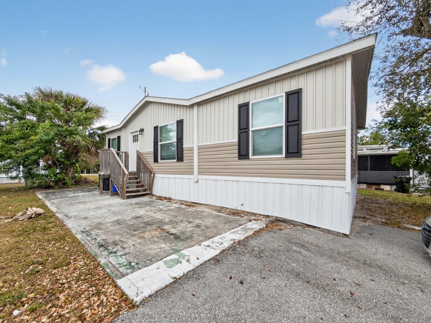 Welcome to this beautifully maintained 2022 hurricane-package - Beach Home for sale in Lake Worth, Florida on Beachhouse.com