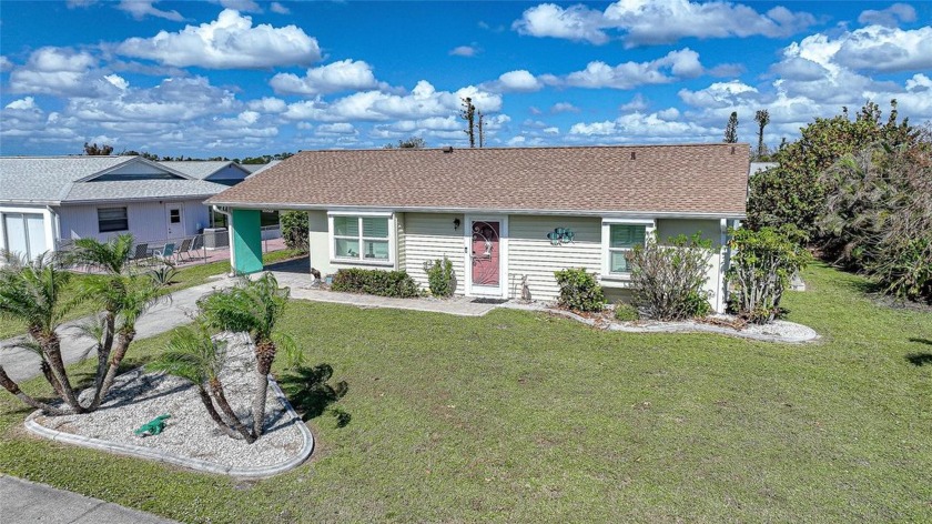 Adorable COASTAL VIBES home in Gardens of Gulf Cove with IMPACT - Beach Home for sale in Port Charlotte, Florida on Beachhouse.com