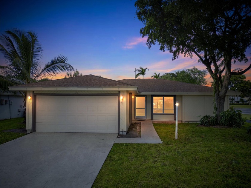 Welcome to this single-family home in the highly desirable gated - Beach Home for sale in West Palm Beach, Florida on Beachhouse.com