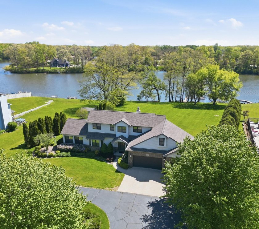 Impeccably maintained lakefront home offering 3,850 finished - Beach Home for sale in Portage, Indiana on Beachhouse.com