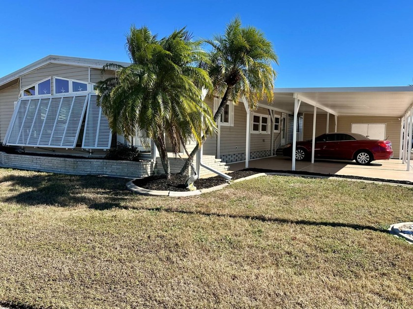 Welcome to this oversized manufactured home offering 1,800 - Beach Home for sale in Nokomis, Florida on Beachhouse.com
