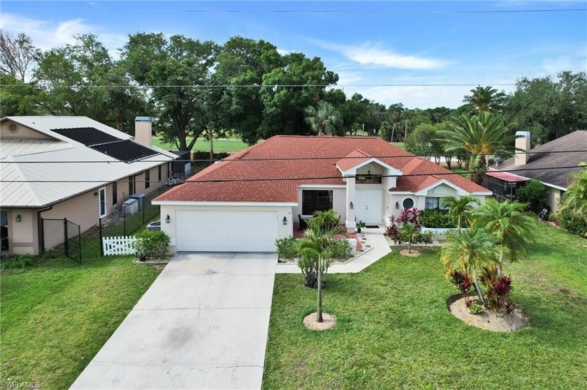 Experience luxury living at Golfside Village with NO HOA fees in - Beach Home for sale in Lehigh Acres, Florida on Beachhouse.com