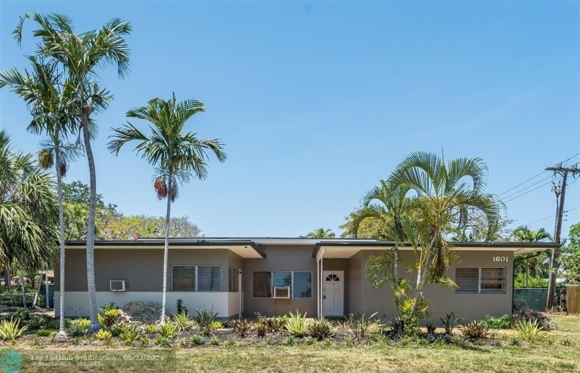 Discover this charming Mid-Century Modern retreat in Poinsettia - Beach Home for sale in Fort Lauderdale, Florida on Beachhouse.com