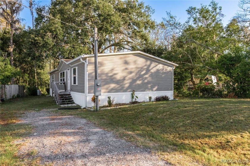 Welcome home to this 2022-built, spacious 3 Bedroom, 2 Bath - Beach Home for sale in New Port Richey, Florida on Beachhouse.com