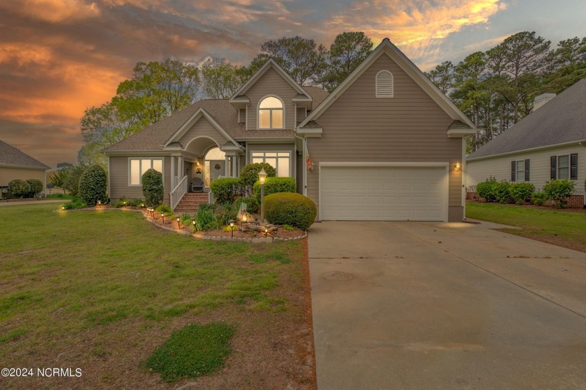 This lovely golf course home is located in a gated community - Beach Home for sale in Hertford, North Carolina on Beachhouse.com