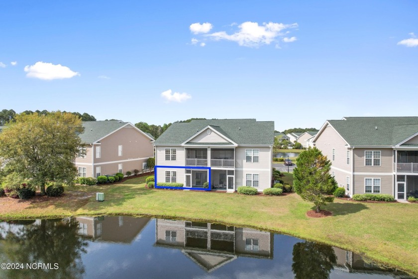 Enjoy phenomenal views of the pond and golf course from this - Beach Condo for sale in Sunset Beach, North Carolina on Beachhouse.com