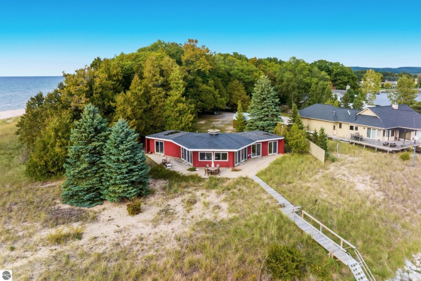 The ICONIC red house at the end of Starkey Point in Arcadia with - Beach Home for sale in Arcadia, Michigan on Beachhouse.com