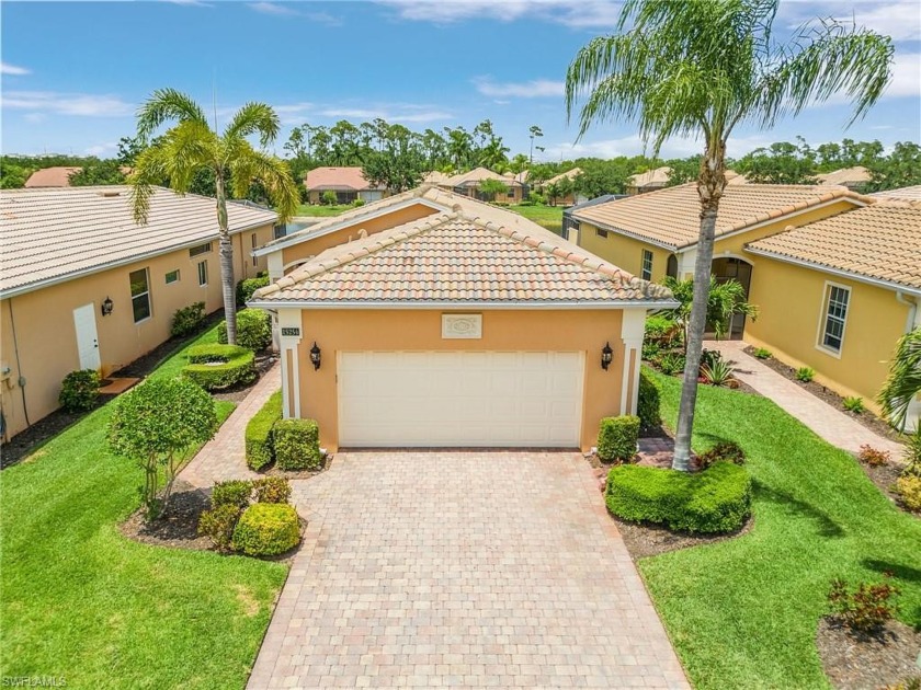 Just Listed Lakeview Pool Home in Tuscany Cove! This home - Beach Home for sale in Naples, Florida on Beachhouse.com