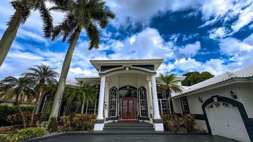Panoramic golf and water views! Elegant home located on the 8th - Beach Home for sale in Coral Springs, Florida on Beachhouse.com