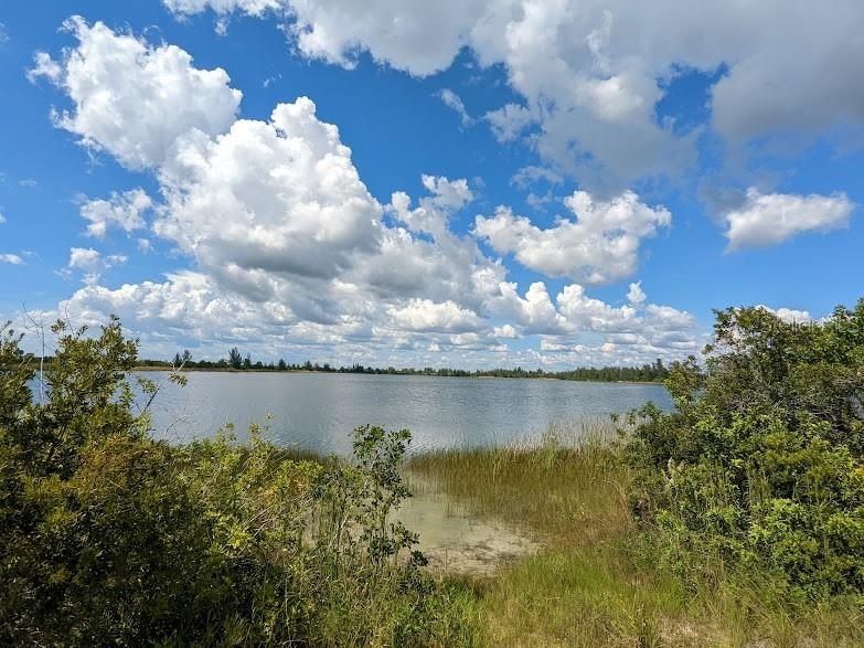 Here is the perfect OVERSIZED LAKE FRONT MULTI-FAMILY vacant lot - Beach Lot for sale in Placida, Florida on Beachhouse.com