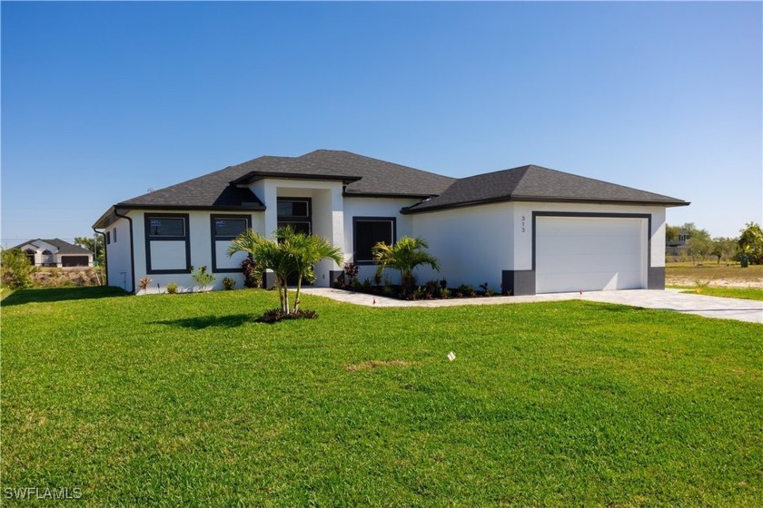 This stunning residence with great location features a modern - Beach Home for sale in Cape Coral, Florida on Beachhouse.com