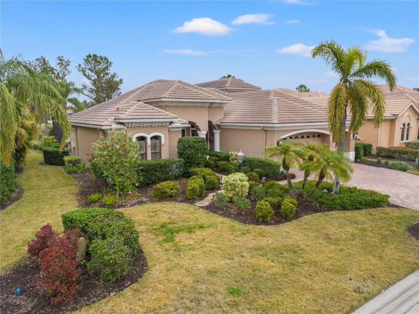 An exquisite residence awaits you in Lakewood Ranch Country Club - Beach Home for sale in Lakewood Ranch, Florida on Beachhouse.com