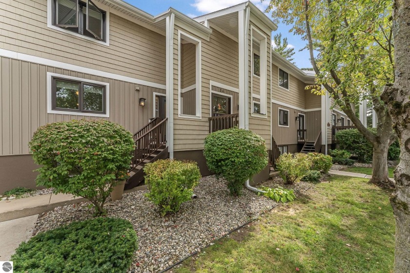 This is a truly special offering in one of East Bay's most - Beach Condo for sale in Traverse City, Michigan on Beachhouse.com