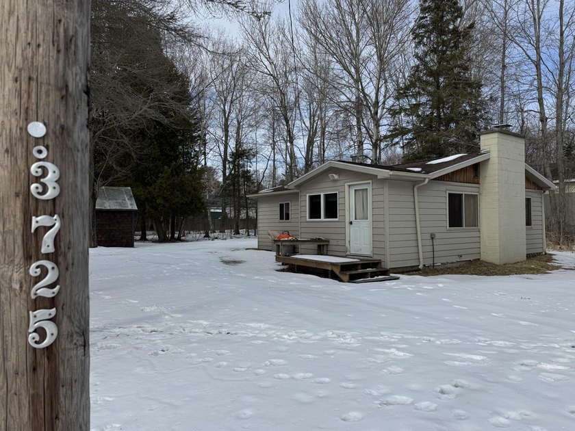 Tucked away in a peaceful setting, this charming 2-bedroom - Beach Home for sale in Black River, Michigan on Beachhouse.com