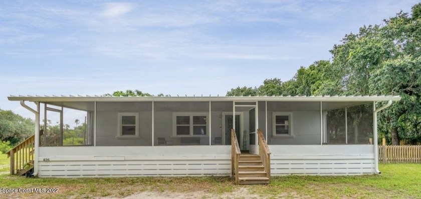 In the heart of Merritt Island! This 4 bedroom 2 bath home has - Beach Home for sale in Merritt Island, Florida on Beachhouse.com