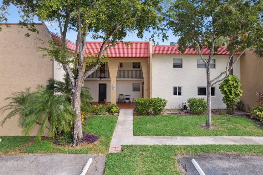 Don't miss this desirable 1st-floor corner unit with stunning - Beach Condo for sale in West Palm Beach, Florida on Beachhouse.com