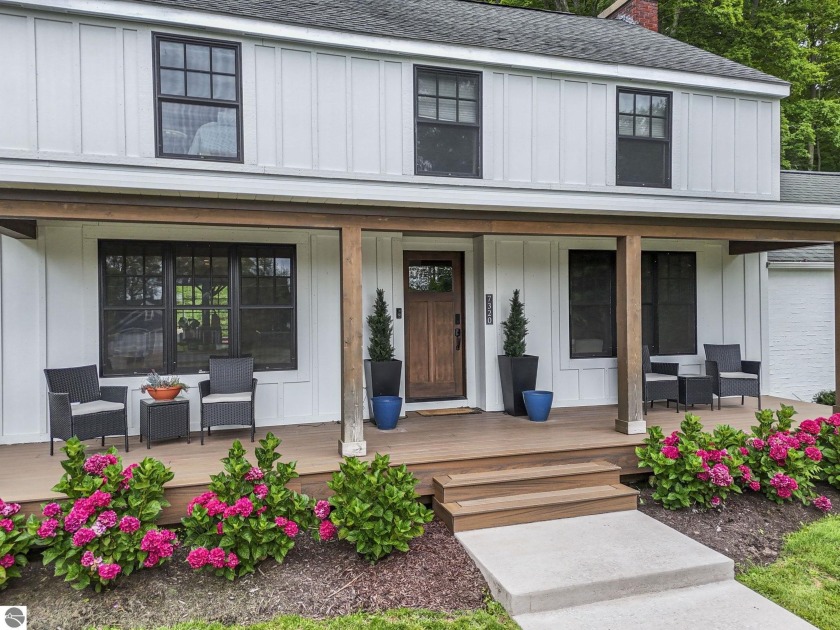 This beautifully renovated colonial on Peninsula Drive is - Beach Home for sale in Traverse City, Michigan on Beachhouse.com