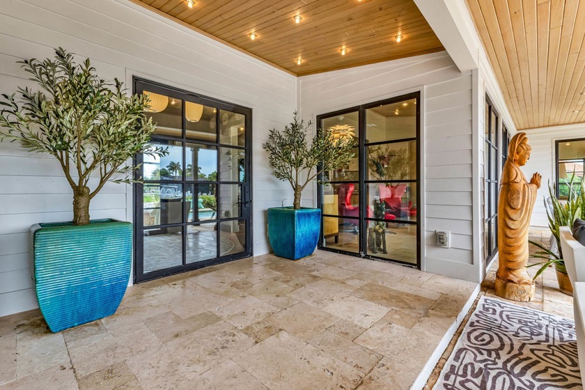 Mid Century Modern style meets 21st Century practicality. Modern - Beach Home for sale in Punta Gorda, Florida on Beachhouse.com